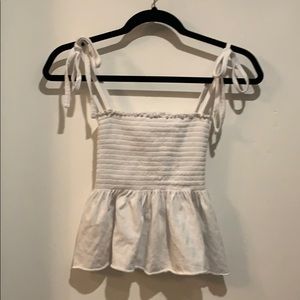 White flows and rubbed shirt